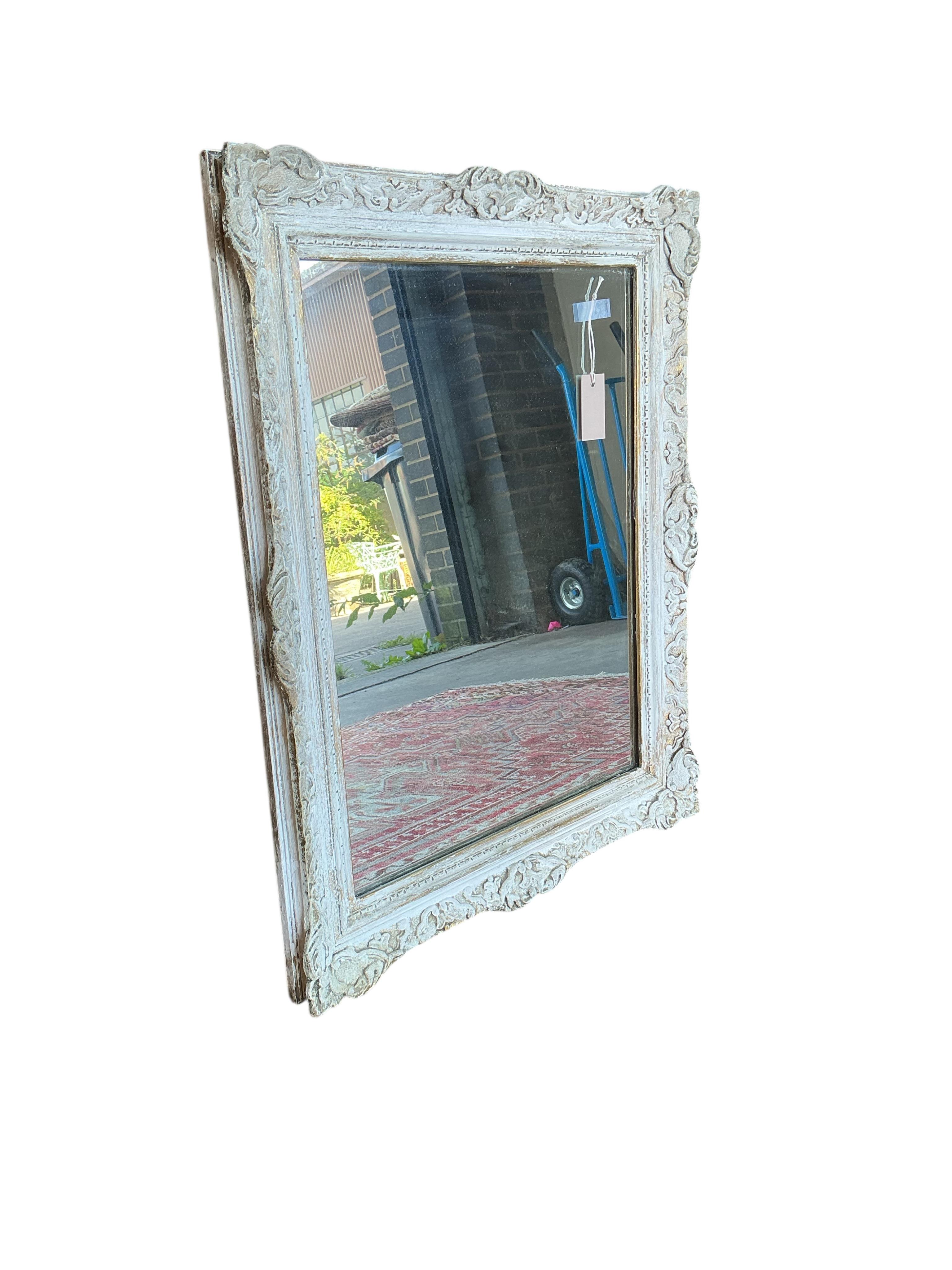 A Victorian style rectangular wall mirror, later painted, repaired, width 60cm, height 76cm